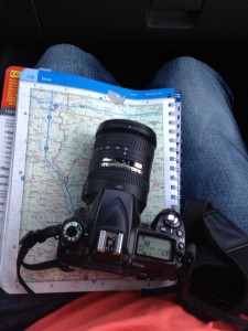 How I travel.  Map book and camera.